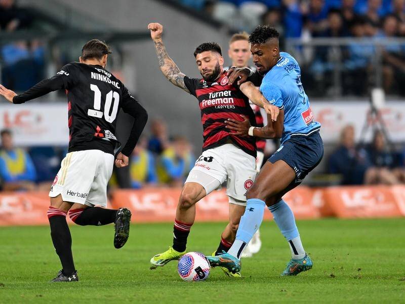 Brandon Borrello (centre) may not play for Western Sydney again this season after his derby injury. (Steven Markham/AAP PHOTOS)