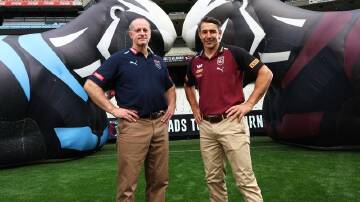 Michael Maguire (l) and Billy Slater will soon name their first squads for 2024's State of Origin. (Con Chronis/AAP PHOTOS)