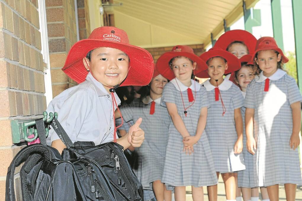 Giving Kindergarten the thumbs up, Carinya Christian School pupil-Wesley Law (5). See page 9 for more “big school” photos.